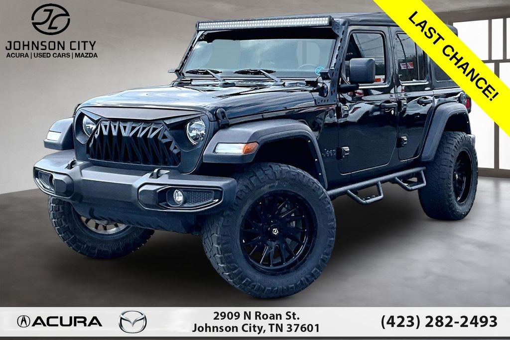 2022 Jeep Wrangler Unlimited Willys in Black Clearcoat — front three-quarter view