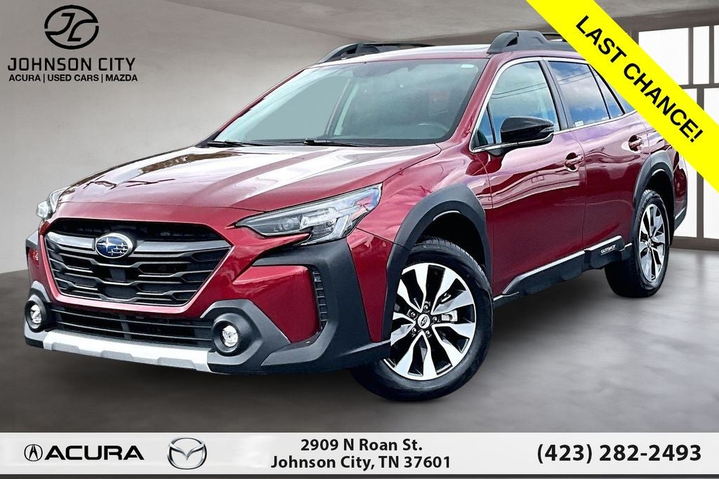 2025 Subaru Outback Limited XT in Crimson Red Pearl — front three-quarter view