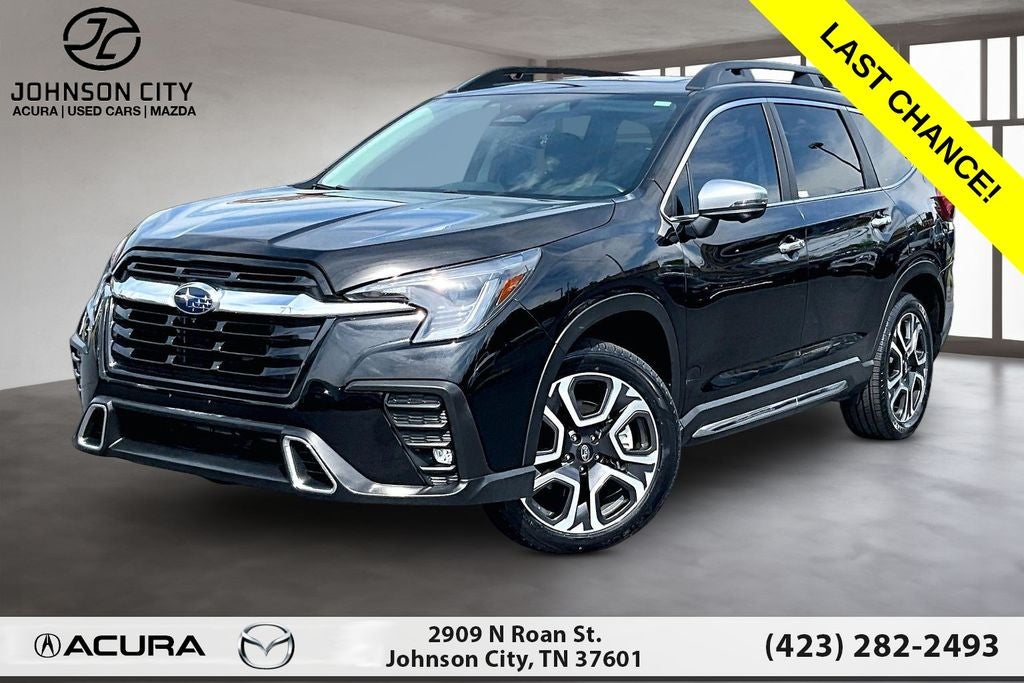 2023 Subaru Ascent Touring in Crystal Black Silica — front three-quarter view