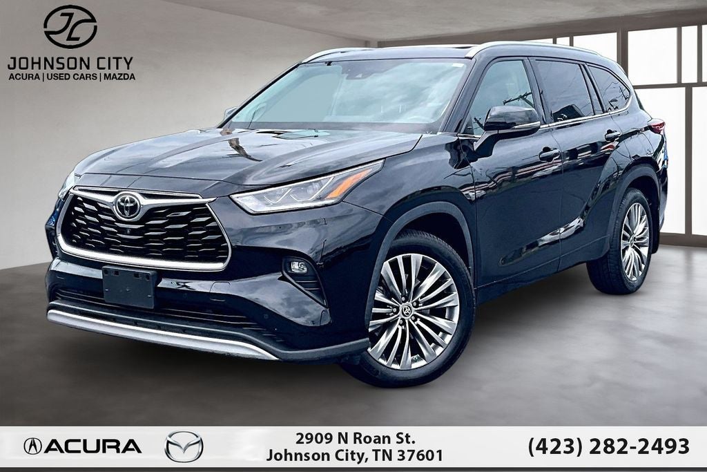 2021 Toyota Highlander Platinum in Midnight Black Metallic — front three-quarter view