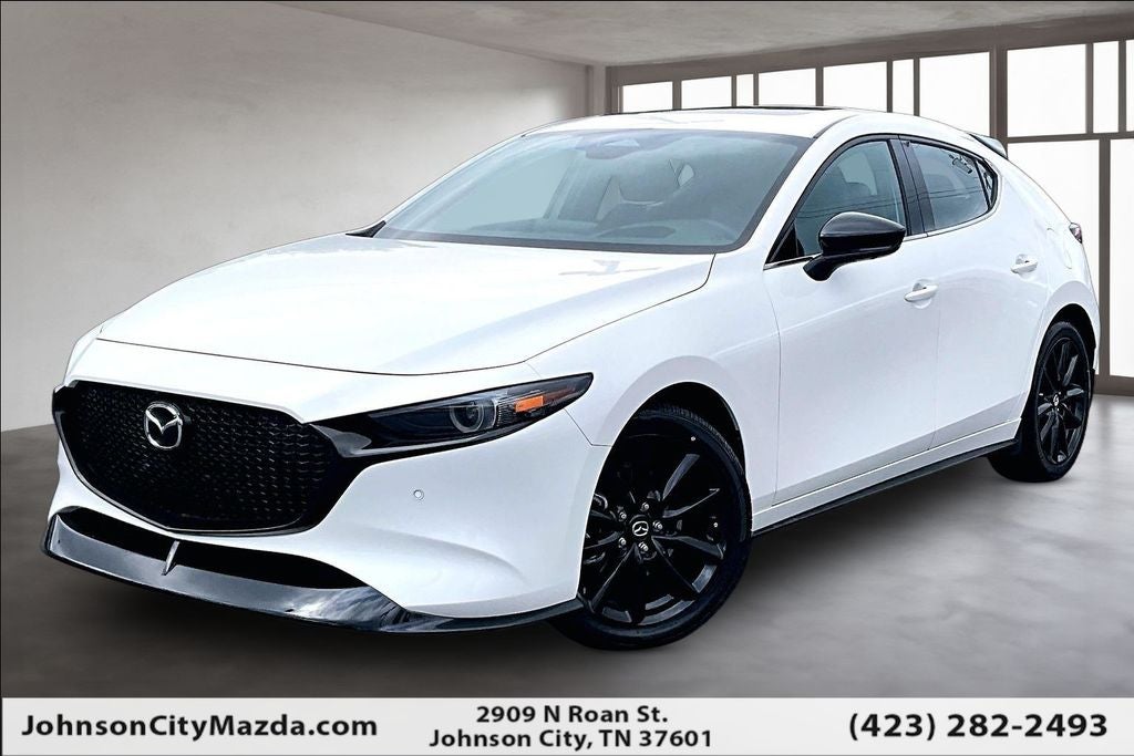 2026 Mazda Mazda3 Hatchback 2.5 Turbo Premium Plus AWD in Snowflake White Pearl — front three-quarter view